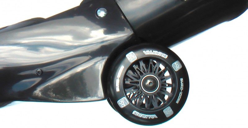 Detail view of the black wheel of elbow of Black-Black Buggy Rollin Full set