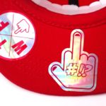 finger under the red WTF rollerman cap