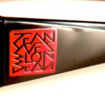 detail of red square signature designed by Jean Yves Blondeau buggy rollin team glasses