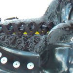 detail of the design cloud and dragon on the boob of buggy rollin woman chest